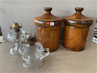 (2) Canisters and (2) Oil Lamps