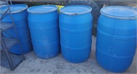 (4) Plastic Barrels With Lids