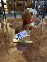 Tin wind-up jumping dog toy