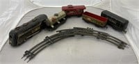 Box of old metal train cars and track, incomplete,