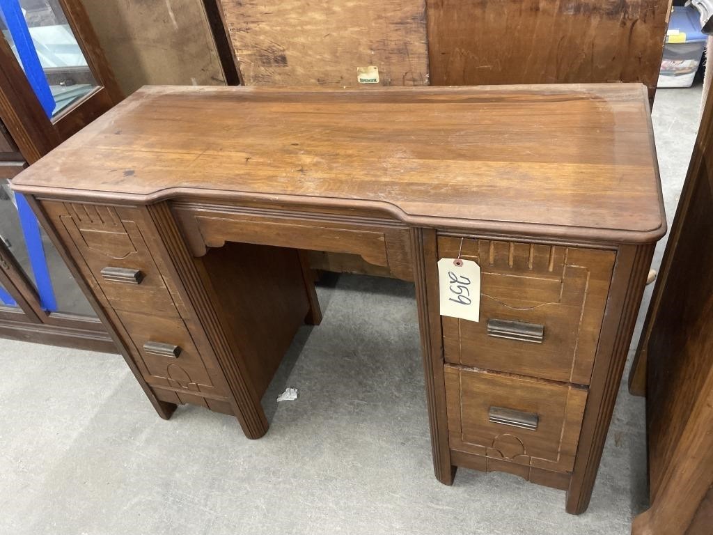 Wooden 4 drawer desk. 17 X 41 X 28