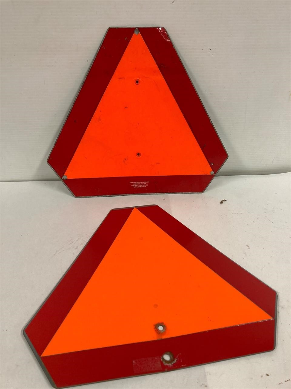 2 slow moving signs.