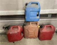 3 Gas Cans And A Water Can