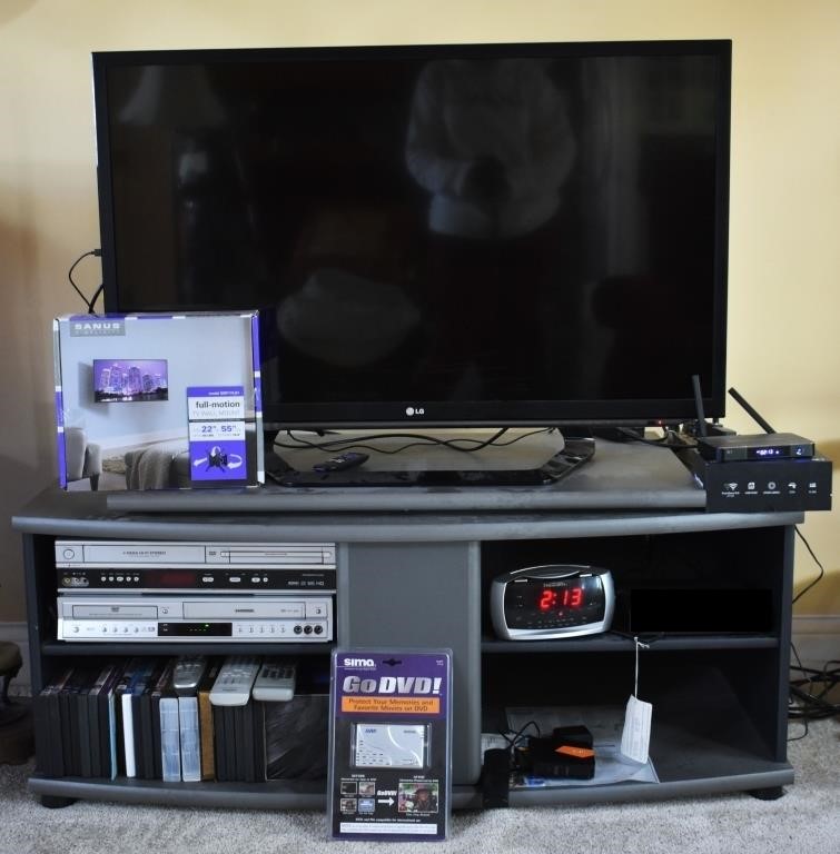 42" LG TV, Cabinet Stand, Roku, DVD/VHS Players ++