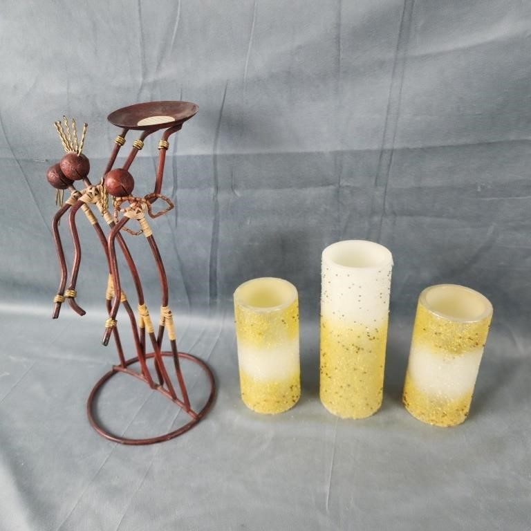 3 Led candles and African candle holder