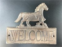 Cast iron Welcome sign with silhouette of horse on