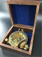 Mahogany and brass bound box with a desk top brass