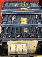 Tacklebox with some lures and hooks