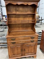 One drawer two door cabinet with plate holder