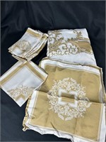 White And Gold Napkins And Table Cloth