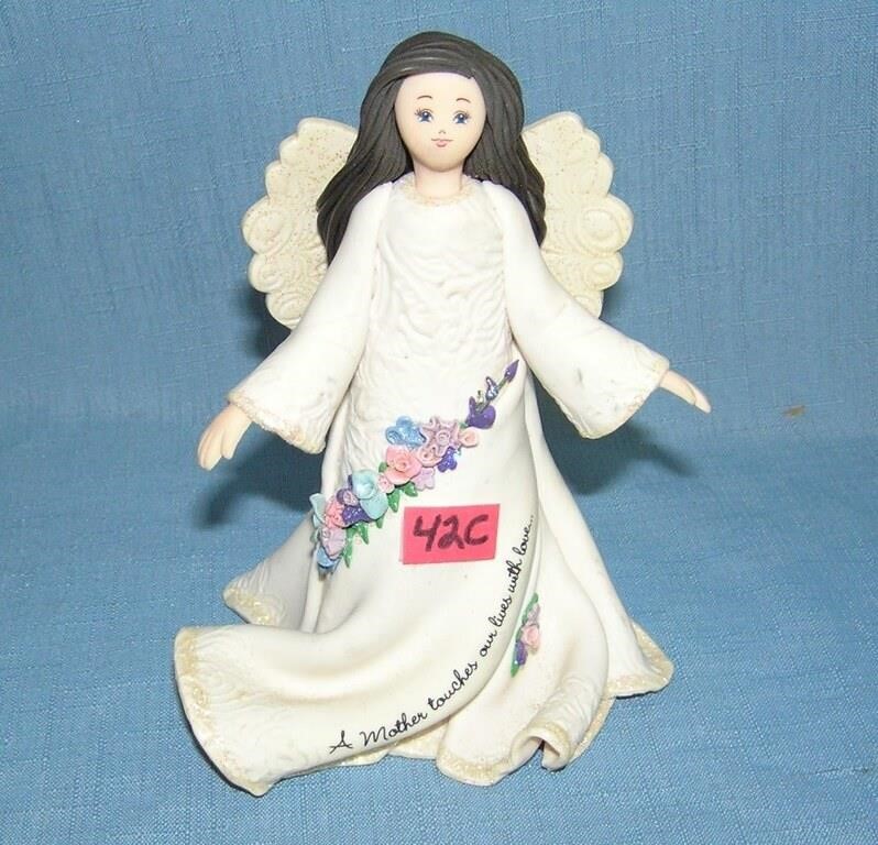 Mother kneeded angel figure