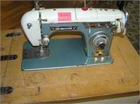 Zig Zag Deluxe sewing machine and cabinet