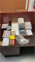 Various Nu kote parts, office supplies.