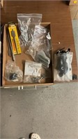 Various hardware, drill bits, applicator, car
