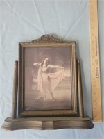 Old swinging picture frame w risque dancing girl