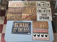 10 license plates and 2 signs