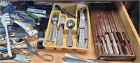 Drawer full of utensil