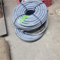 3 rolls of conduit