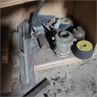 Bottom shelf- masonary tools, c clamps