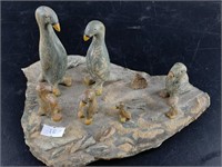 Soapstone carving of family of birds on soapstone