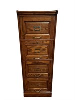 A Winners Only 4 Drawer Wood Filing Cabinet