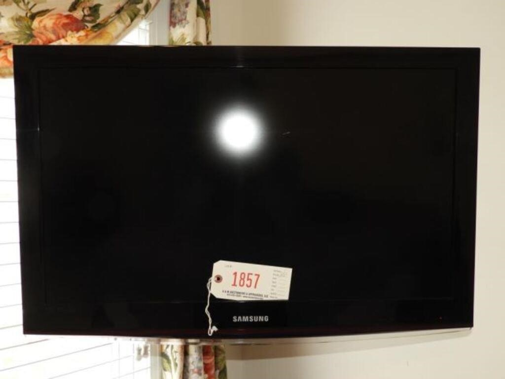 2010 Samsung model LN 32” flat screen TV with wall