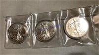 3 American Eagle silver rounds, 1 ounce each,
