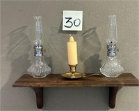 Two Small Oil Lamps and Candle on Shelf