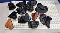 Assorted Revolver holsters group all to go