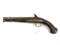 Flintlock pistol. 18th century. Carved and inlaid