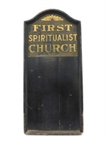 First Spiritualist Church wooden sign with