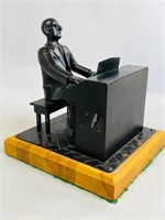 VINTAGE CAST METAL MUSIC BOX OF MAN PLAYING PIANO