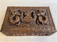 AN ELABORATELY CARVED CHINESE EXPORT BOX