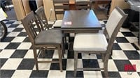 Small Table w/pull out leaves with 4 Chairs