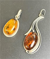 2 VINTAGE STERLING PENDANTS WITH AMBER STONES