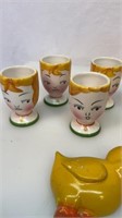 Face and chick egg cups, etc