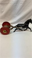 Antique horse friction toy