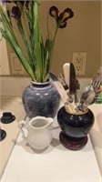 Blue pottery vase with orchids, Okura Japan jar
