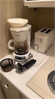 Mr coffee pot, toaster, can opener, cork pullers