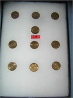 Collection of solid brass US state commemoratives