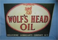 Wolf's Head oil retro style advertising sign