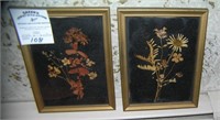 Pair of leaf decorated art pieces both framed