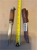 Western fixed blade knife with leather sheath