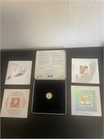 Canada 2000 collectable coin and stamps