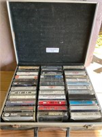 Assorted cassettes and artist with case.