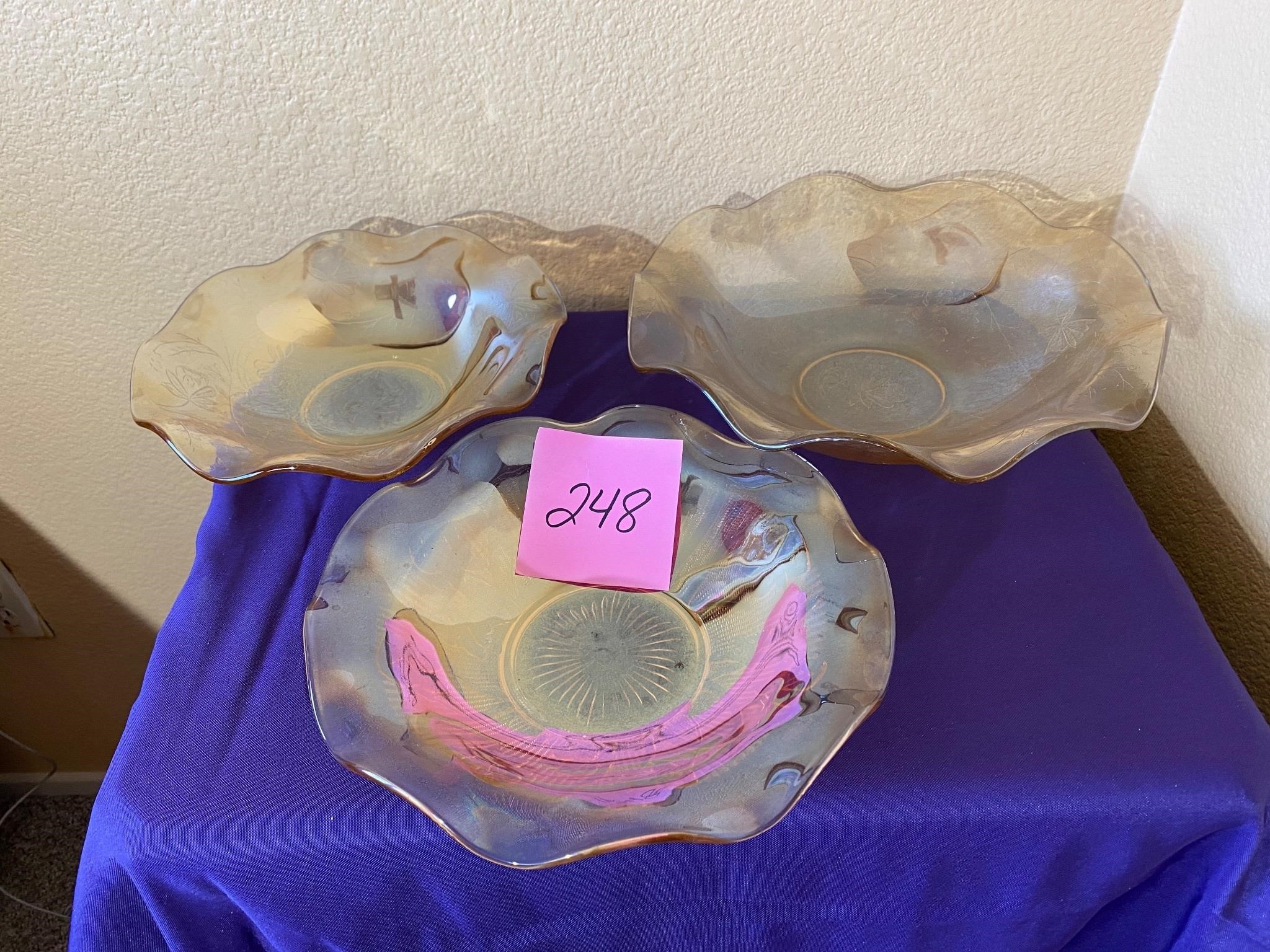 Three carnival glass decorative bowls #248