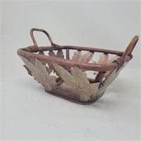 Wicker basket with copper color leaves