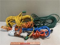 LARGE LOT EXTENTION CORDS ONE APPEARS TO BE REPAIR