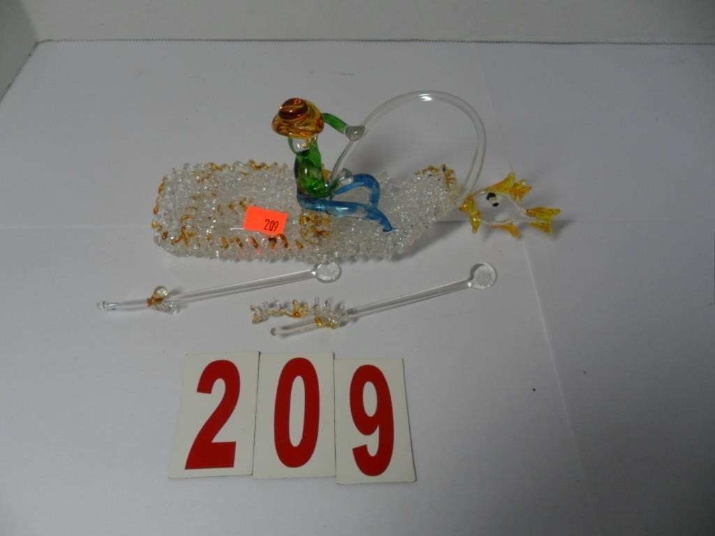 Glass Fisherman in boat with fish