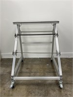 Aluminum rack for spools of cable on casters.